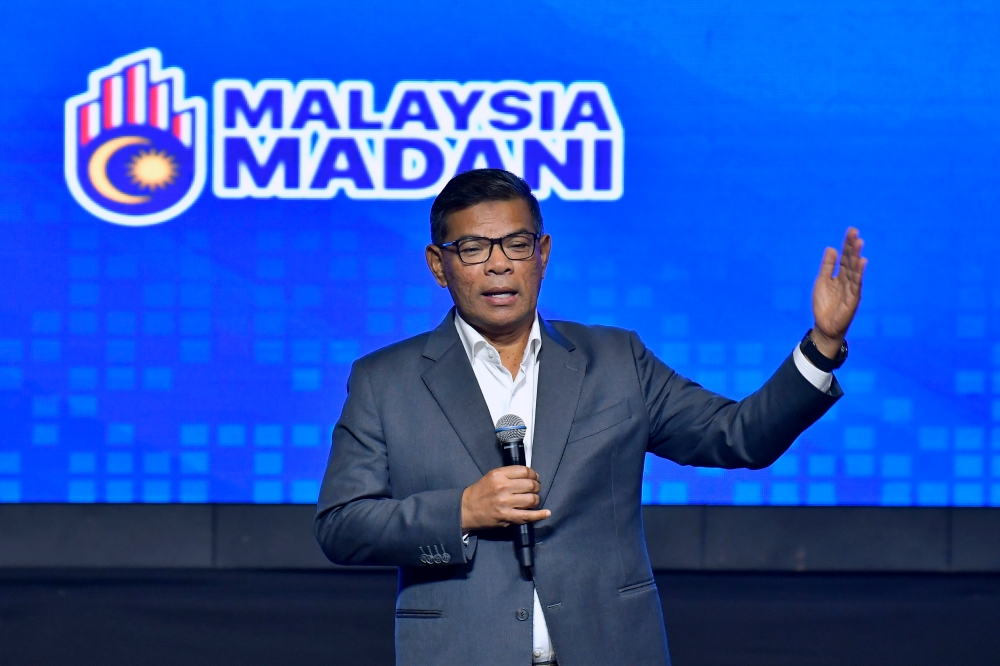 Home Minister Datuk Seri Saifuddin Nasution Ismail speaks at the ministry’s monthly assembly in Putrajaya, July 23, 2024. — Bernama pic  