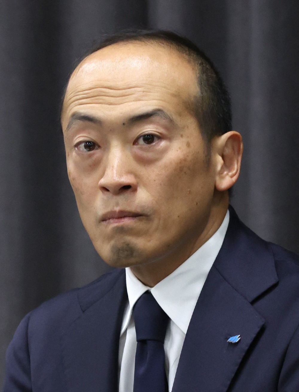 This picture taken on March 29, 2024 shows Kobayashi Pharmaceutical Co President Akihiro Kobayashi attending a press conference in Osaka. The company said president Akihiro Kobayashi and chairman Kazumasa Kobayashi were leaving their posts. Both men belong to the firm’s founding family. — Jiji Press/AFP pic