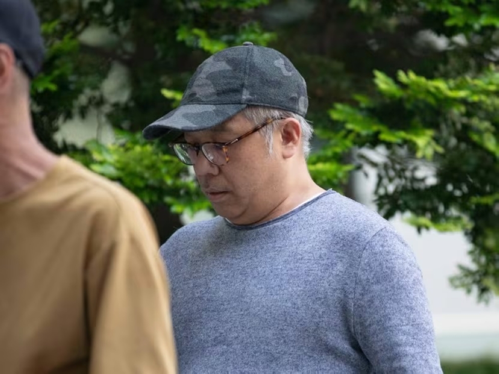 Tor Kar Wai arrives at the State Courts in Singapore July 23, 2024. — TODAY pic