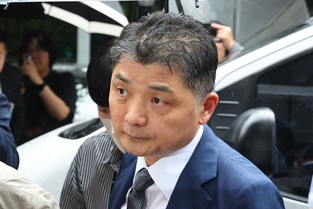 South Korean authorities arrested Kim Beom-su, the billionaire founder of tech giant Kakao Corp, yesterday on accusations of stock manipulation during the acquisition of a K-pop agency last year. — Reuters pic