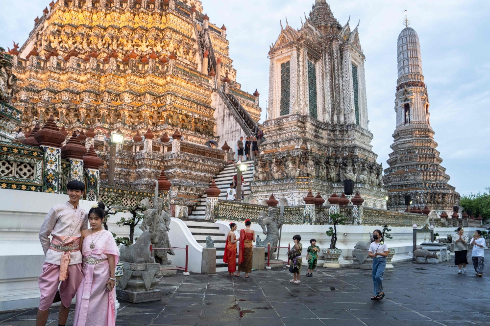 More than 50 million eligible citizens will be able to begin registering for a digital payment of 10,000 baht (RM1,292) from August 1. — AFP pic
