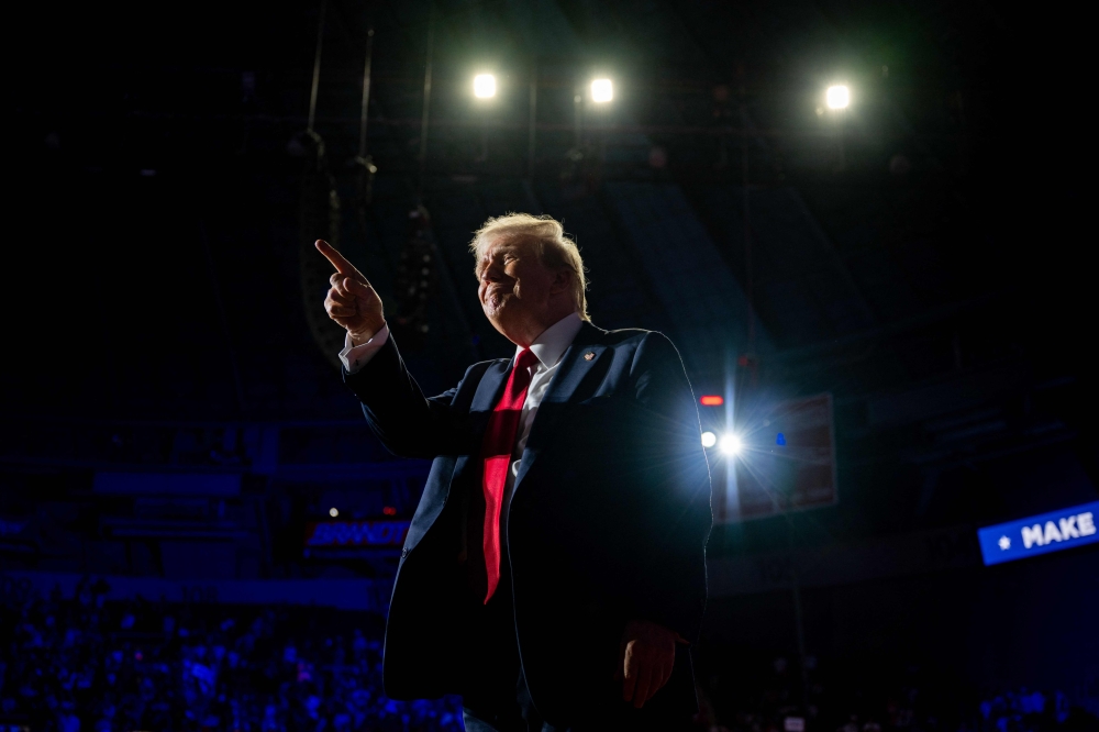 Donald Trump launched a volley of attacks against US Vice President Kamala Harris yesterday, calling her a ‘radical left lunatic’ in his first rally since she became the de facto Democratic Party nominee for November’s election. — AFP pic