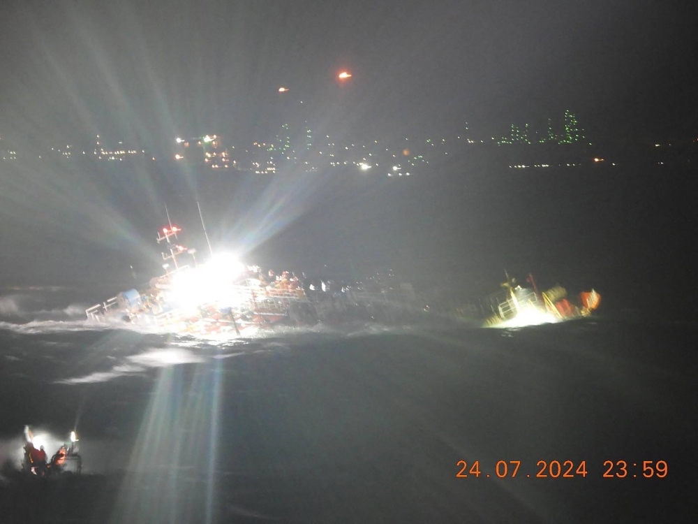 The vessel sank as heavy rains fuelled by Typhoon Gaemi and the seasonal monsoon lashed Manila and surrounding regions in recent days. — AFP pic/Philippine Coast Guard