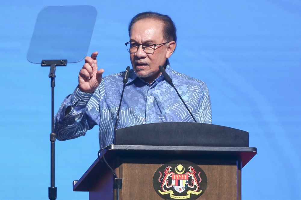 Prime Minister Datuk Seri Anwar Ibrahim speaks during the 100 year anniversary of the Malaysian Insolvency Department at PICC in Putrajaya July 25, 2024. —Picture by Yusof Mat Isa