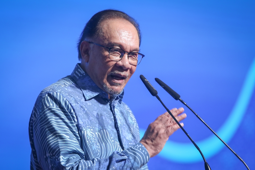 This file photograph shows Prime Minister Datuk Seri Anwar Ibrahim speaking at an event in Putrajaya on July 25, 2024. — Picture by Yusof Mat Isa