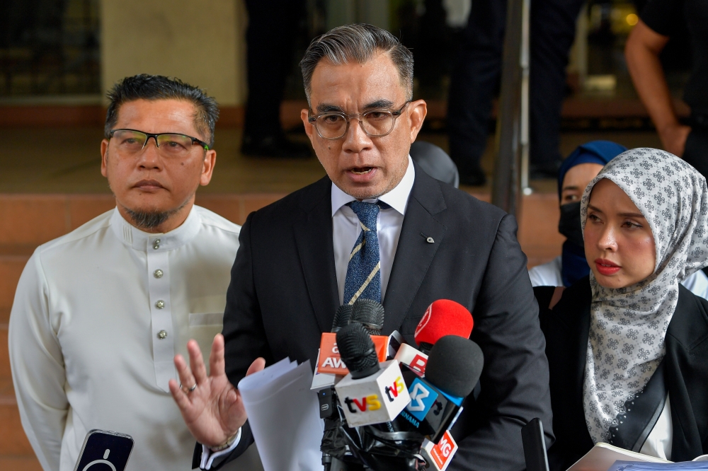 Lawyer Fahmi Abd Moin, representing the father of autistic child Zayn Rayyan Abdul Matiin, speaks at a press conference in front of the Petaling Jaya Court Complex, July 26, 2024. — Bernama pic 