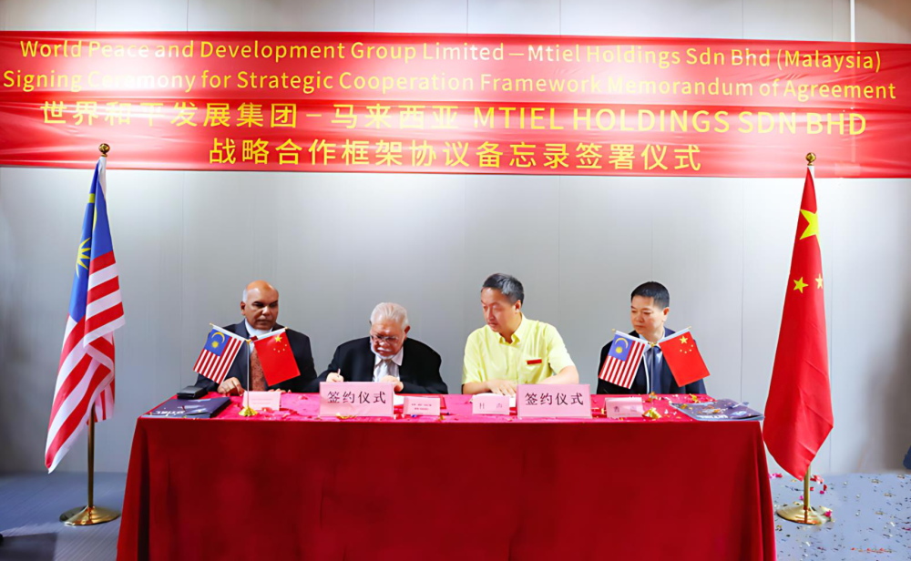 (Left to right) Project advisor Datuk Rashid Ghani, MTIEL managing director Nazri Ramli, and World Peace and Development Limited chief executive Dr Du Sheng attend a signing ceremony in Shenzen, China, on July 25, 2024. — Picture courtesy of MTIEL