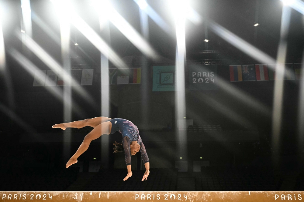 US gymnast Simone Biles trains at the Bercy Arena in Paris on July 25, 2024, ahead of the Paris 2024 Olympic Games. — AFP pic