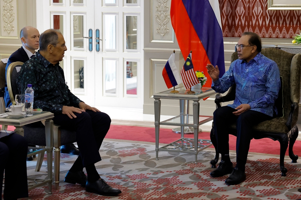 Prime Minister Datuk Seri Anwar Ibrahim (right) receives a courtesy call from Russian Foreign Minister Sergey Lavrov (left) at Seri Perdana July 28, 2024. — Bernama pic