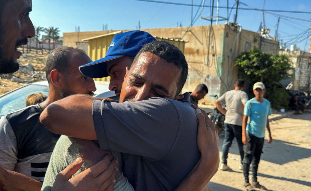 Palestinians mourn a relative killed in an Israeli strike, amid Israel-Hamas conflict, at Nasser hospital, in Khan Younis, southern Gaza Strip July 28, 2024. — Reuters pic 