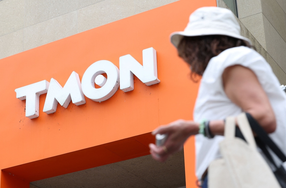 A person passes in front of TMON headquarters amid WeMakePrice and TMON, owned by Singapore-based e-commerce platform Qoo10, are facing increasingly delayed payments, in Seoul July 24, 2024. — Reuters pic
