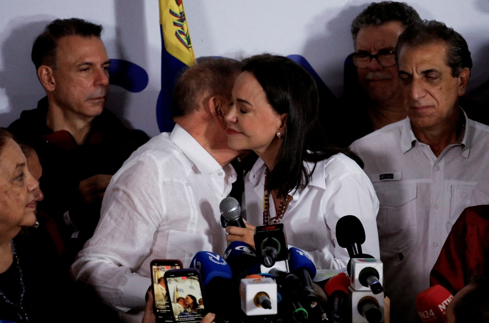 Venezuelan opposition leader Maria Corina Machado and opposition presidential candidate Edmundo Gonzalez react after the electoral authority announced that Venezuelan President Nicolas Maduro has won a third term, during the presidential election, in Caracas, Venezuela July 29, 2024. — Reuters