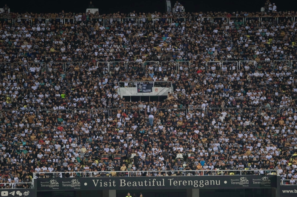 Spectators react during the first leg of the FA Cup semi-final between Terengganu FC and Selangor FC at Sultan Mizan Zainal Abidin Stadium in Kuala Nerus, Terengganu July 19, 2024. — Picture via Facebook/Hishamuddin Abdul Karim