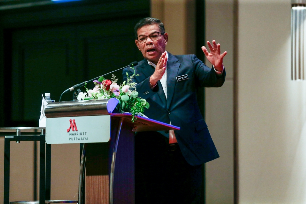 Home Minister Datuk Seri Saifuddin Nasution said the government will draw up policies to end human trafficking in the country based on it's newly launched data system.—Picture by Raymond Manuel