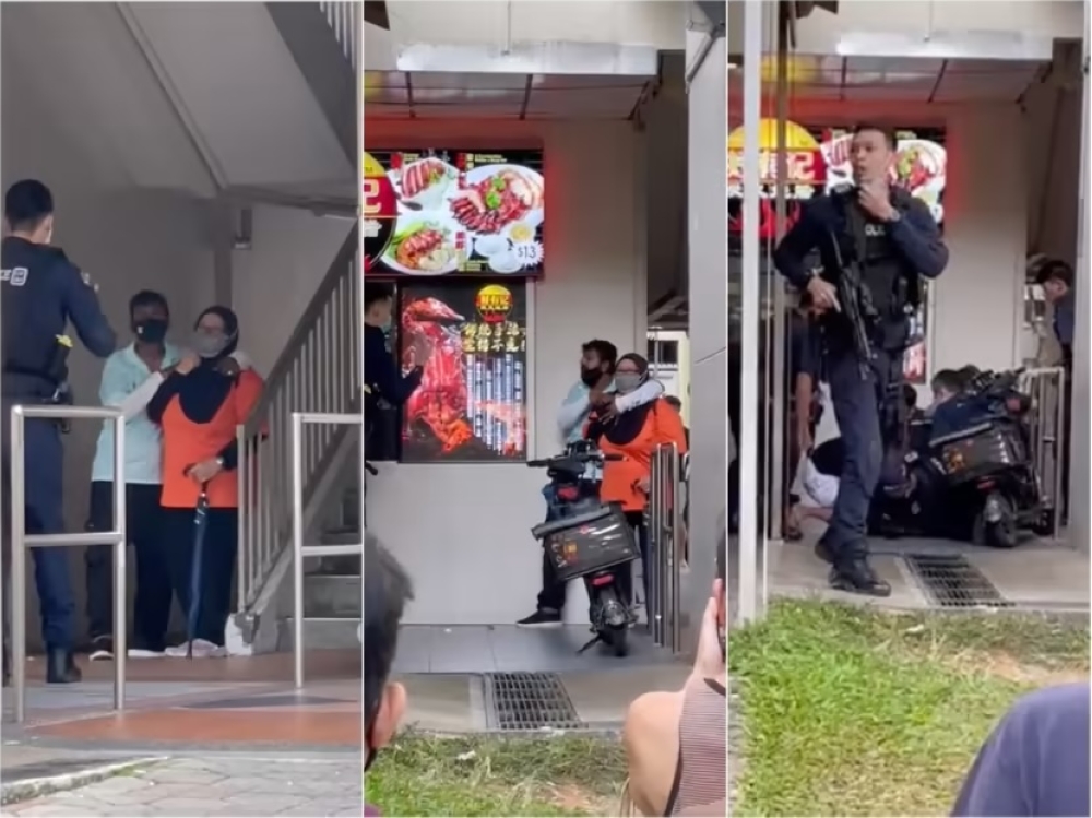 Screenshots of videos posted on Facebook of Mohamed Faizal Mohamed Ariff holding a woman hostage at knifepoint in a standoff with 10 police officers in Yishun. — Facebook screenshots via TODAY