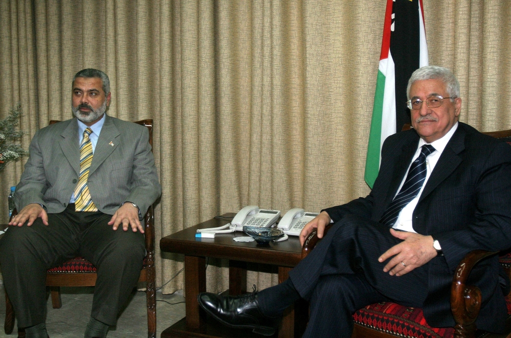 Mahmoud Abbas (right) meets with Ismail Haniyeh at Abbas' office in Gaza City, Saturday, June 10, 2006. — AFP pic