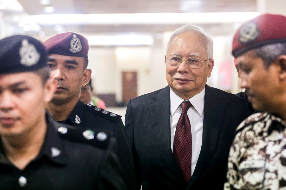 Former prime minister Datuk Seri Najib Razak claimed trial to the three charges of money laundering by accepting illegal proceeds amounting to RM27 million. — Picture by Sayuti Zainudin