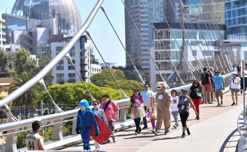 Attendees walk to the convention centre during Comic Con International in San Diego, California, July 28, 2024. Undercover officers posing as sex buyers at last week’s Comic-Con event in California rescued human trafficking victims, including a 16-year-old girl, and made multiple arrests, prosecutors said Wednesday. — AFP pic 