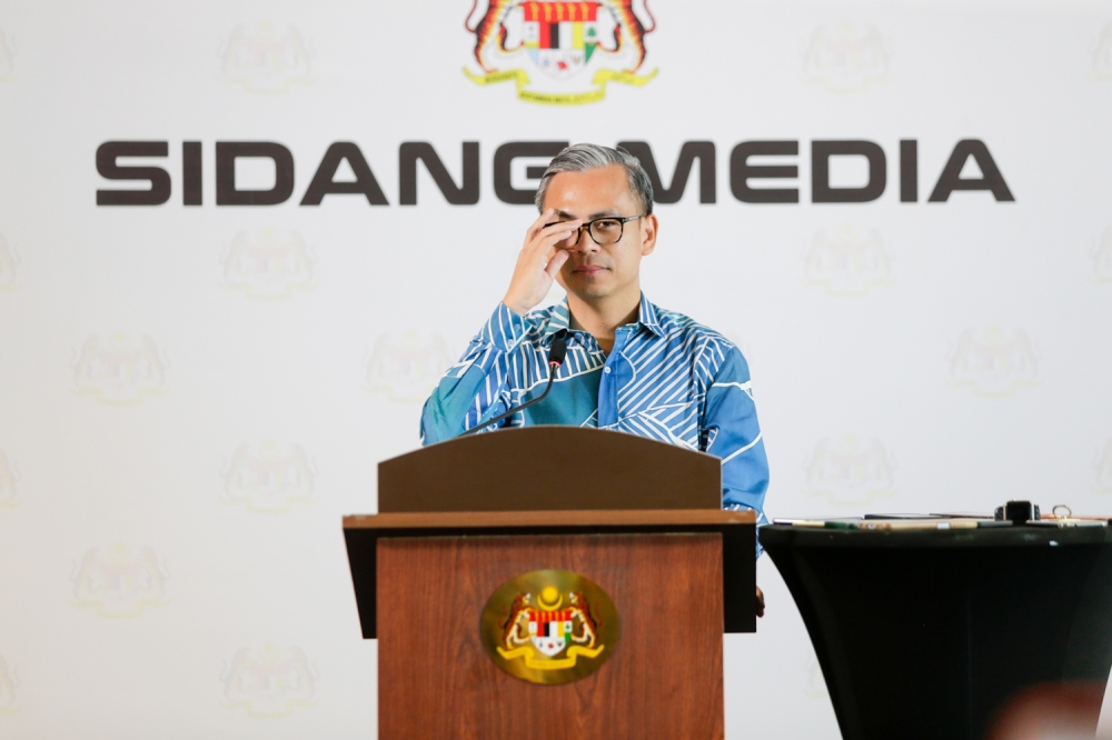 Communications Minister Fahmi Fadzil gives a press conference at the Communications Ministry, Putrajaya on August 1, 2024. — Picture by Raymond Manuel