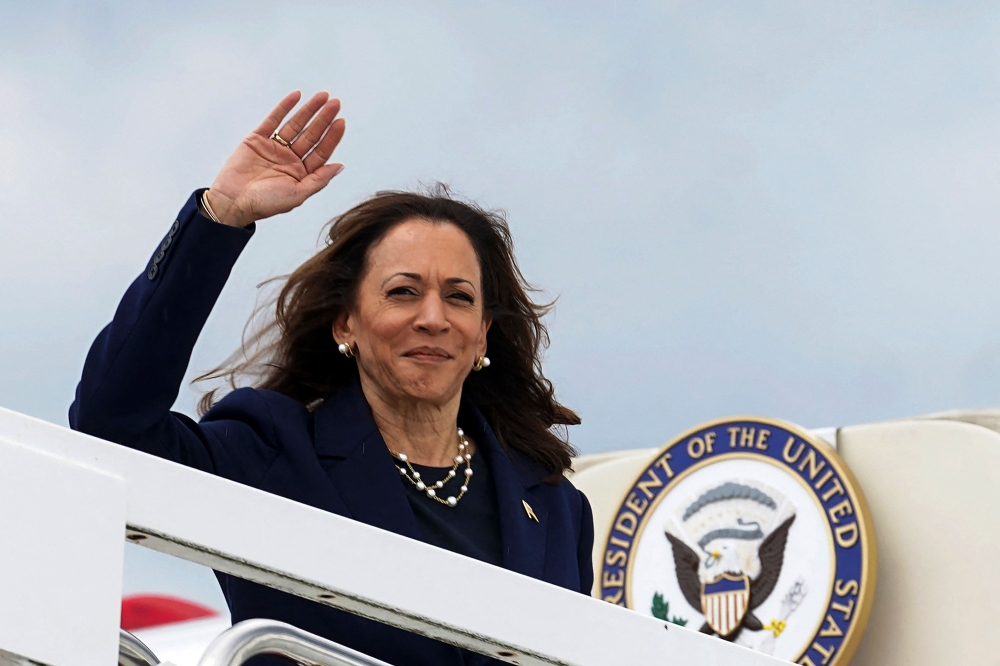 US Vice President and 2024 Democratic presidential candidate Kamala Harris boards Air Force Two as she departs for Houston, Texas, from Joint Base Andrews, Maryland, on July 31, 2024. — AFP pic