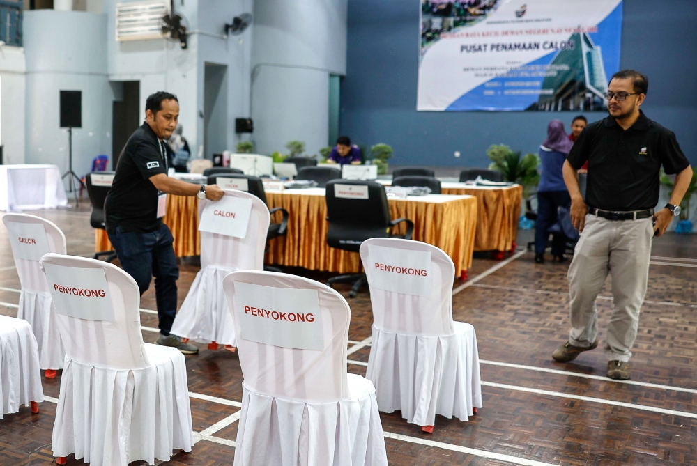 Election Commission personnel prepare for the nomination of candidate due to take place tomorrow at Dewan Perdana, Perdana Complex, Gua Musang District Council in Kelantan, August 2, 2024. — Bernama pic 