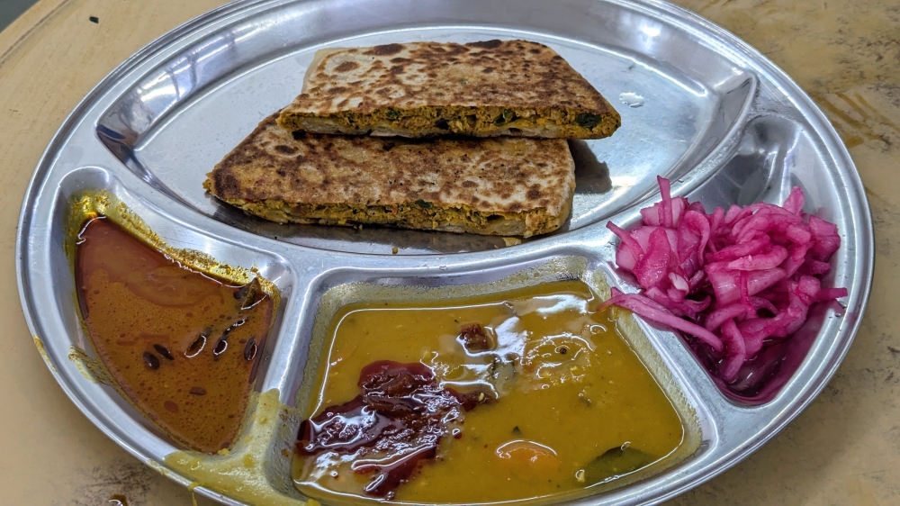 The pork ‘murtabak’ is a good option for those wanting something less heavy. — Picture by Ethan Lau