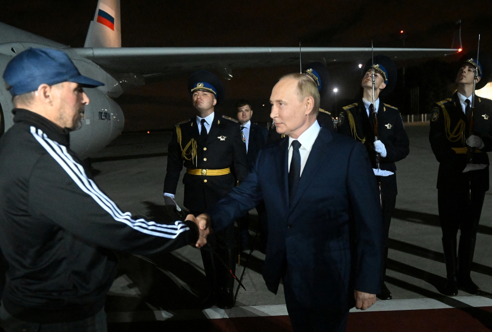 Russia's President Vladimir Putin greets Russian national Vadim Krasikov, who was released in a prisoner exchange between Russia with Western countries, during a welcoming ceremony at Vnukovo International Airport in Moscow, Russia August 1, 2024. — Sputnik/Reuters pool pic