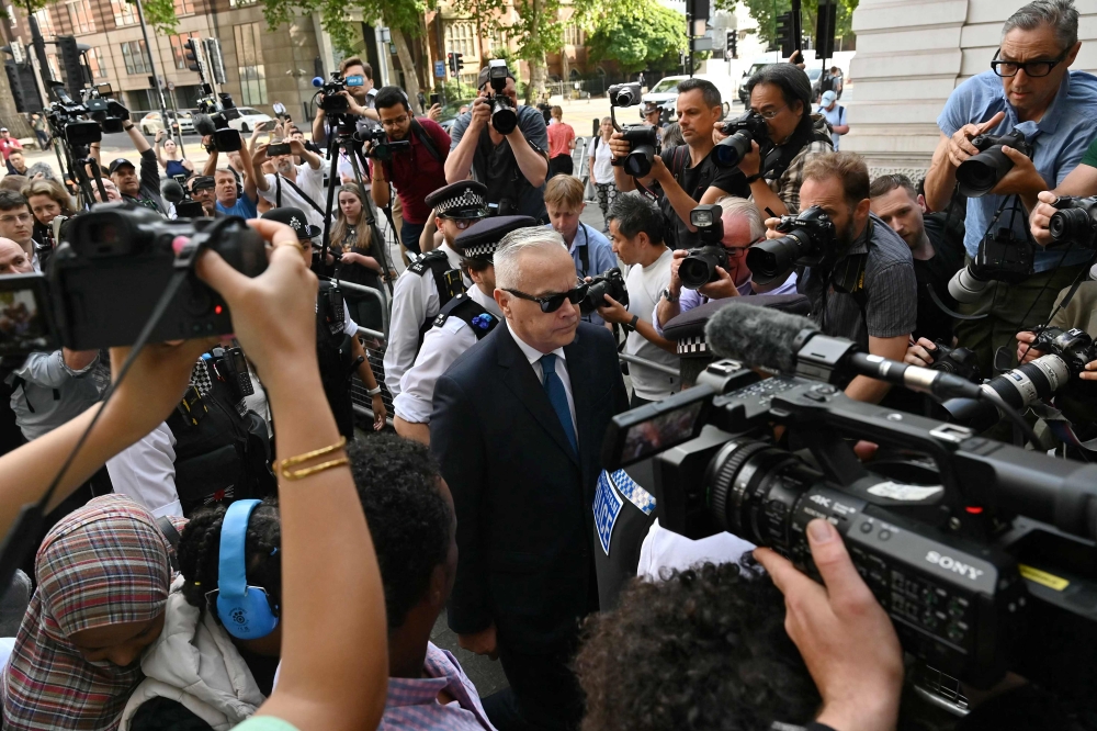 Former BBC news anchor Huw Edwards, one of the most recognisable faces on UK television, arrives at Westminster Magistrates' Court in London on July 31, 2024 after being charged with three counts of making indecent images of children. — AFP pic