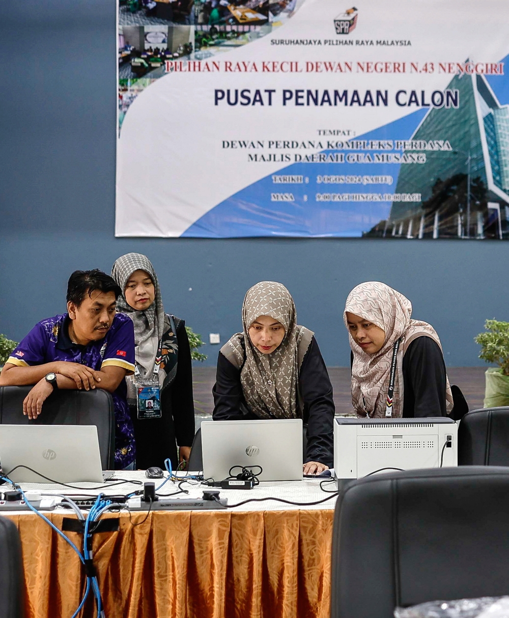 Election Commission officials are at the Dewan Perdana, Kompleks Perdana in Gua Musang, Kelantan which is being used as the nomination centre for the Nenggiri polls August 3, 2024. — Bernama pic
