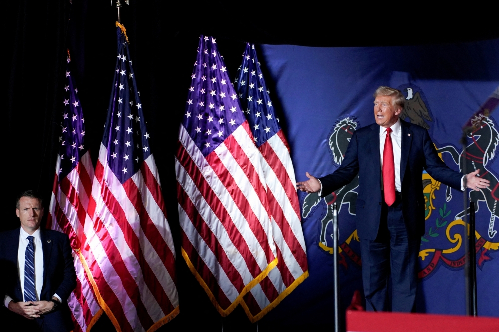 At a rally in Atlanta, Georgia, last night, Republican presidential nominee Donald Trump again appeared to attack Harris’ racial identity. — Reuters pic