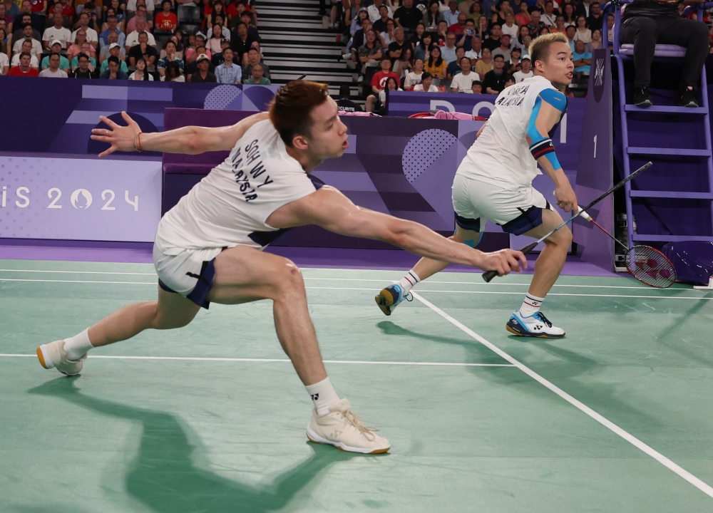 Aaron Chia and Soh Wooi Yik won the Olympic bronze for Malaysia against Kim Astrup-Anders Skaarup Rasmussen of Denmark in at the Porte de La Chapelle Arena, Paris, France on August 4, 2024. — Bernama pic