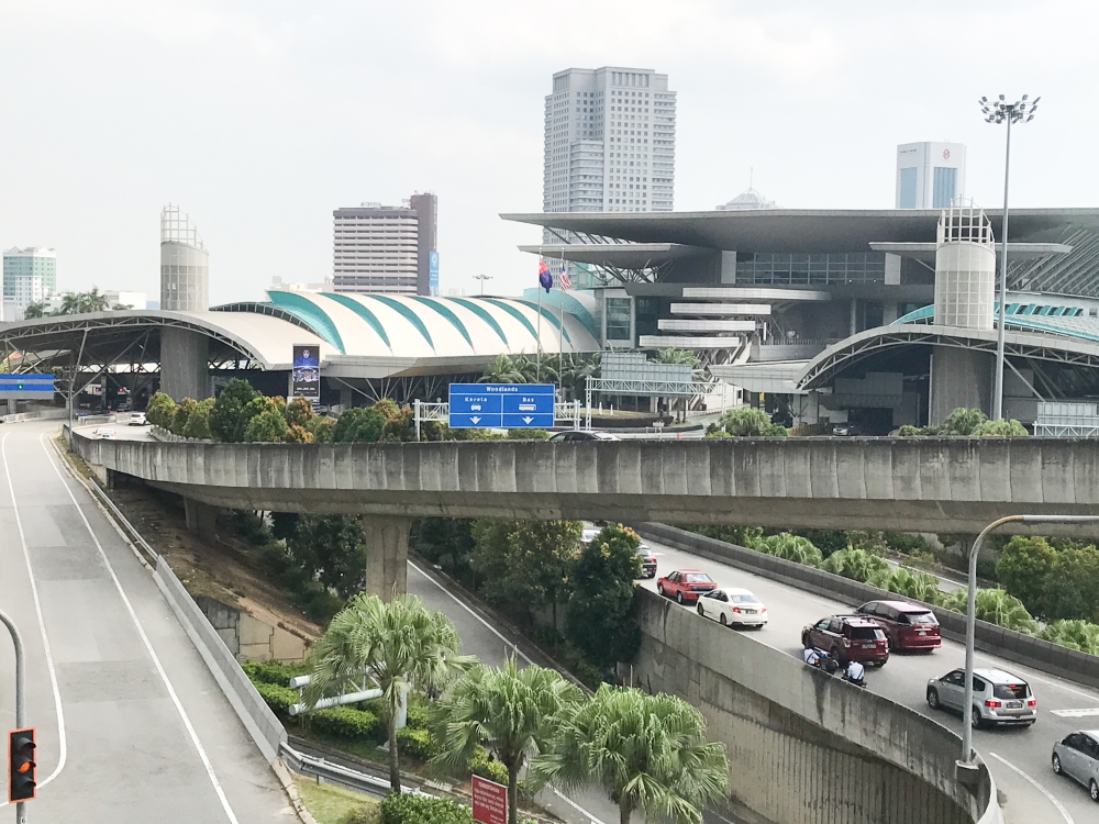Three new apps are being tested to ease congestion at inbound traffic from Singapore at the Malaysian checkpoints. Pictured here is the Sultan Iskandar Building’s (BSI) Customs, Immigration and Quarantine complex in Johor Baru. — Picture by Ben Tan