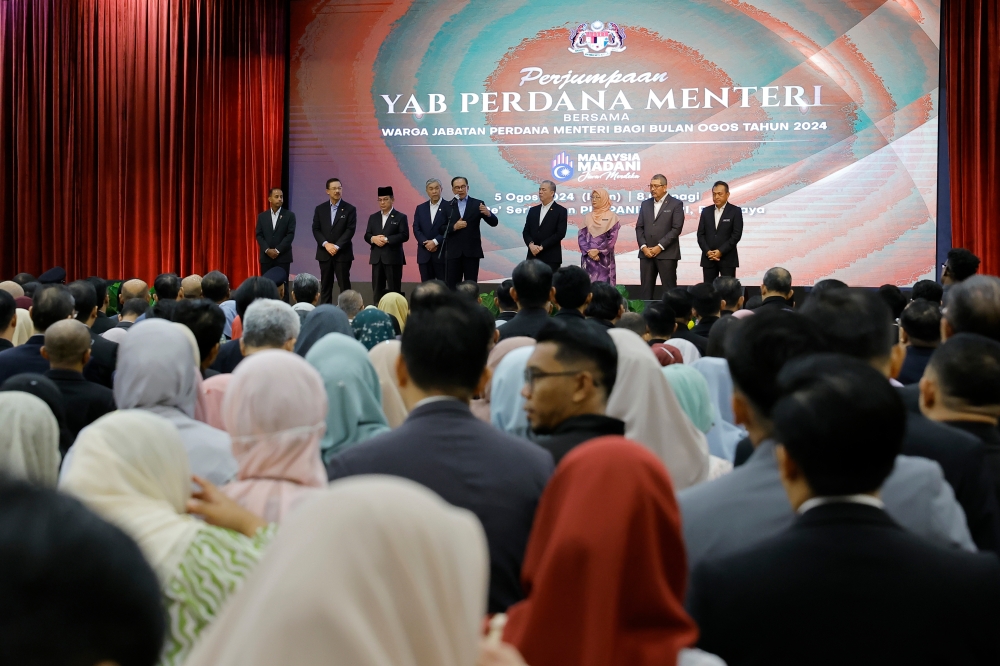 Staff from the Prime Minister’s Department attend a monthly meeting with Prime Minister Datuk Seri Anwar Ibrahim in Putrajaya on August 5, 2024. — Bernama pic