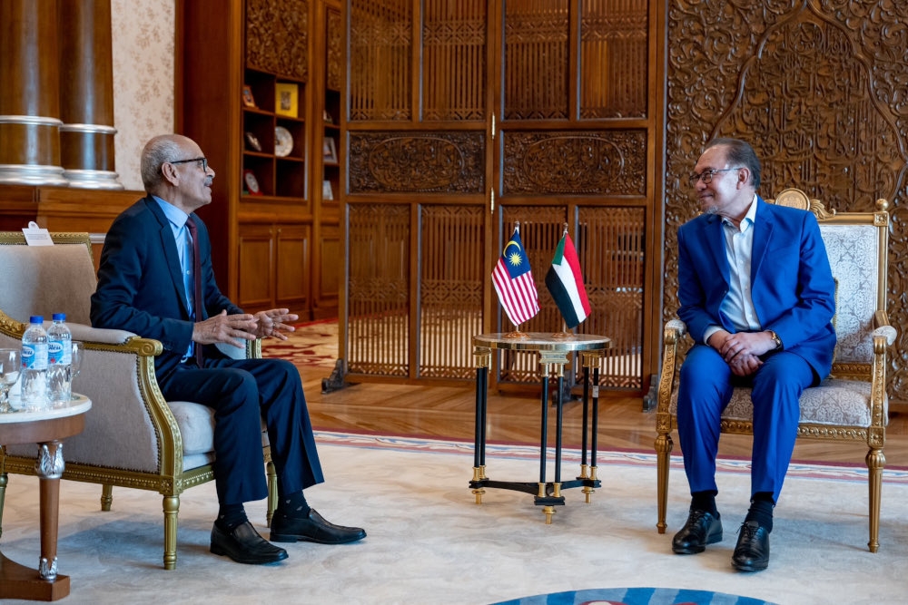 Prime Minister Datuk Seri Anwar Ibrahim with Sudan’s Acting Foreign Minister Hussein Awad Ali Mohamed in Putrajaya, August 6, 2024. — Picture from X/Anwar Ibrahim 
