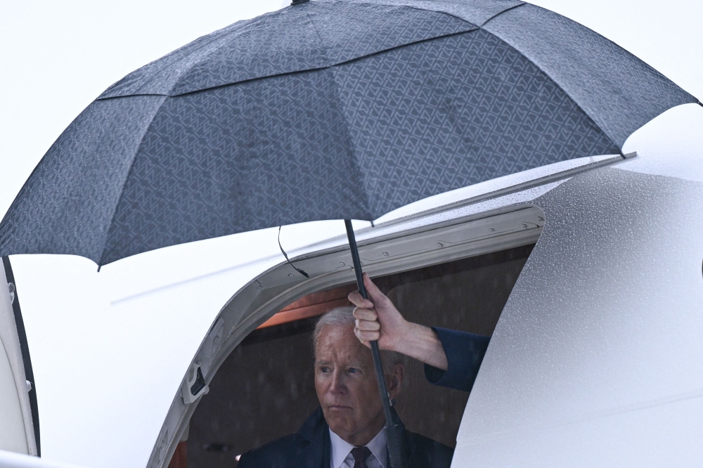 US President Joe Biden exiting the Air Force One plane on August 8, 2024. — AFP pic