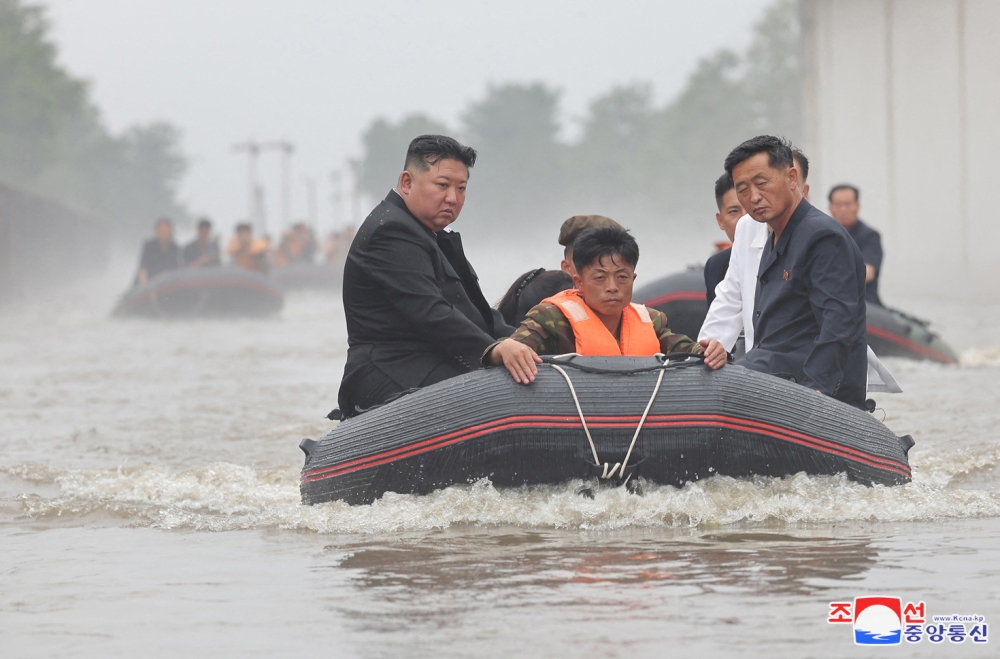 North Korean leader Kim Jong-un and Premier Kim Tok-hun visit a flood-affected area near the border with China, in North Pyongan Province, North Korea, in this undated photo released July 31, 2024 by North Korea’s official Korean Central News Agency. — Reuters pic/KCNA