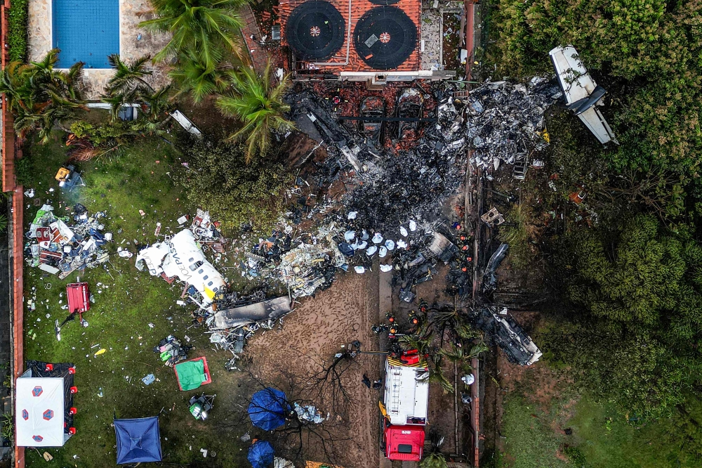 This photo shows an aerial view of the wreckage of an airplane that crashed with 61 people on board in Vinhedo, Sao Paulo State, Brazil, on August 10, 2024. — AFP pic