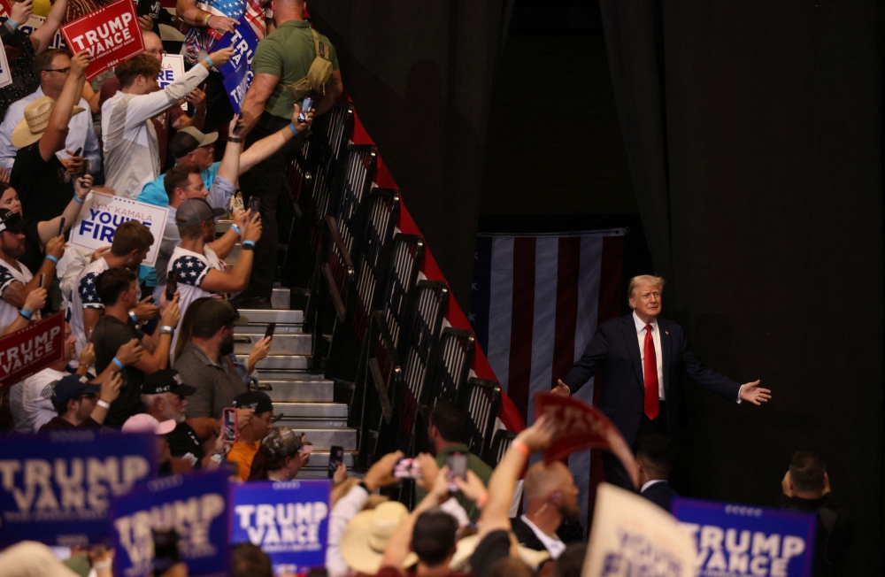 Republican presidential nominee and former US President Donald Trump gestures at a campaign rally in Bozeman, Montana, U.S., August 9, 2024. — Reuters pic