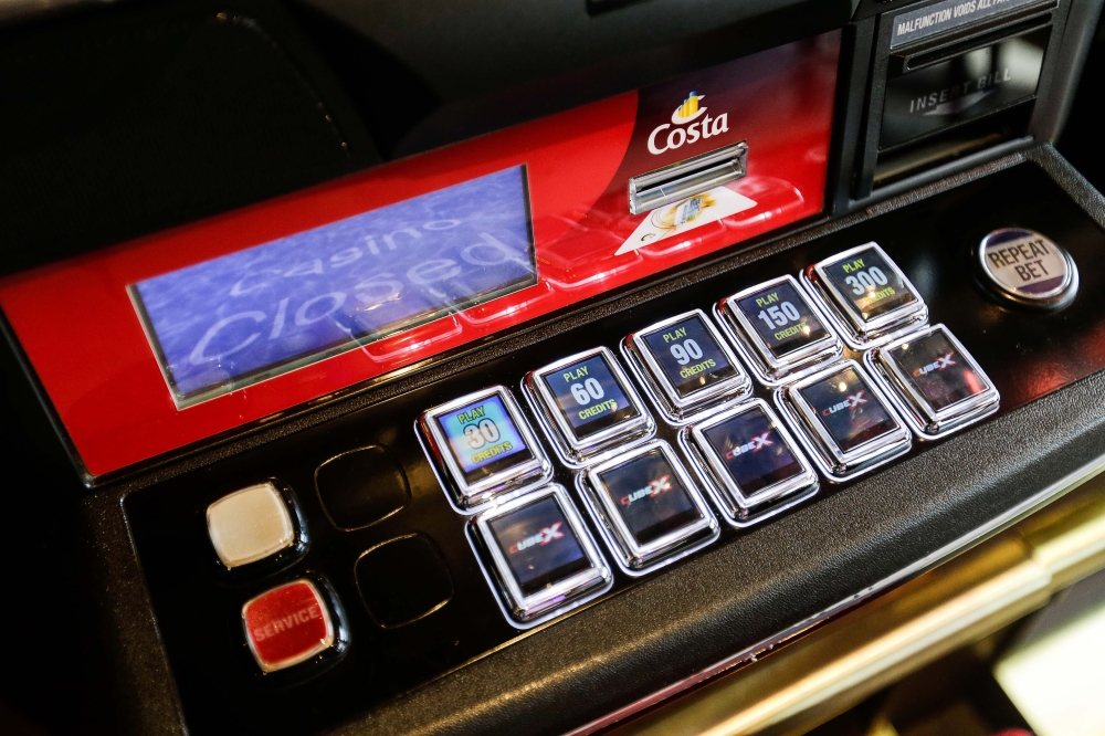 Slot machines known as “pokies” are widespread in Australian pubs. — Picture by Saiyuti Zainudin