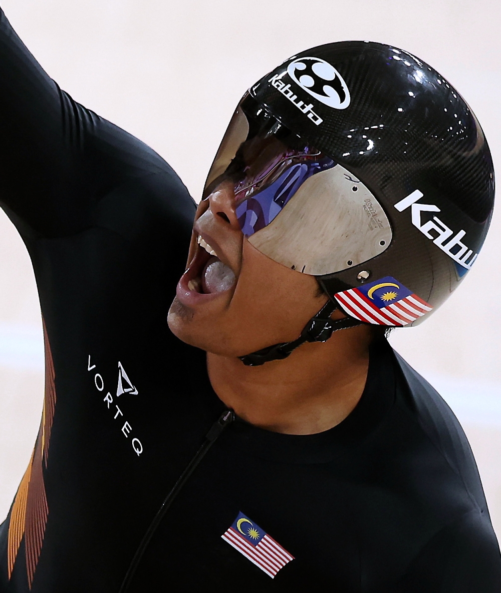National track cyclist Muhammad Shah Firdaus Sahrom in action during the men's keirin repechage event at the Paris 2024 Olympics at the Saint-Quentin-en-Yvelines National Velodrome today.