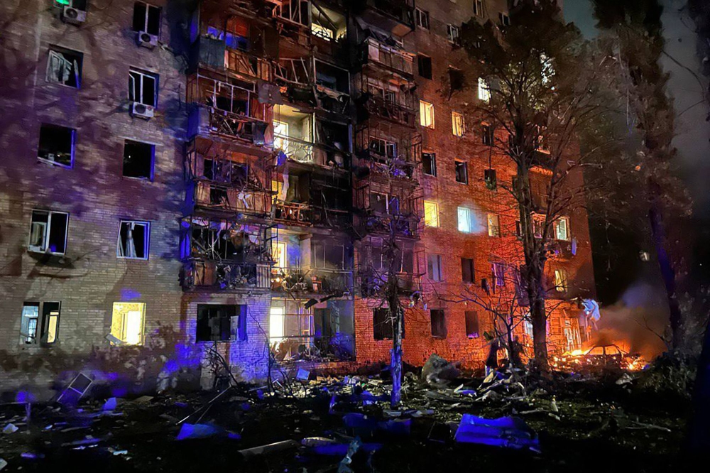 This photograph released on August 11, 2024 on the official Telegram account of Kursk Mayor Igor Kutsak shows a fire in a residential building following a missile attack in Kursk, Russia. — Telegram/@glavaigorkutsak handout pic via AFP