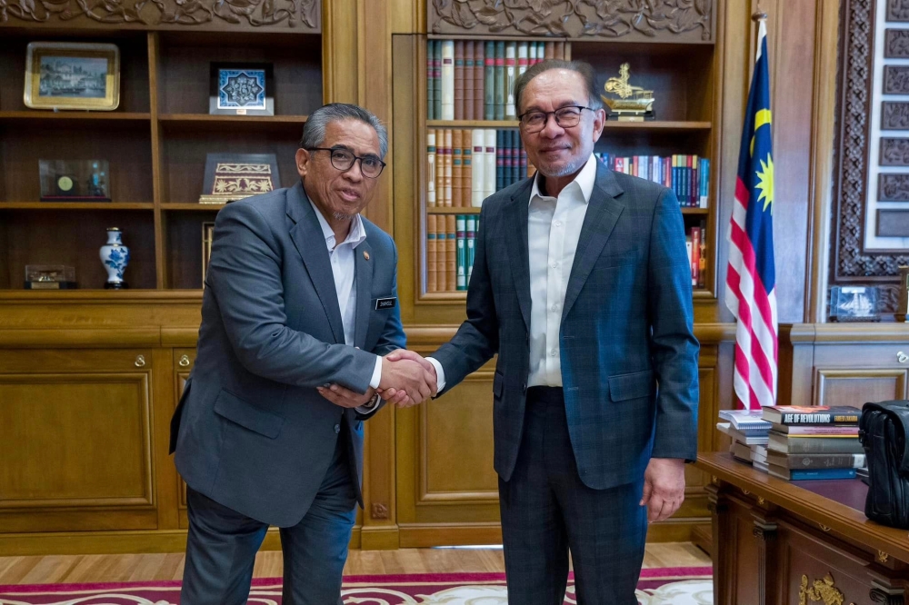 Prime Minister Datuk Seri Anwar Ibrahim met newly appointed Chief Secretary to the Government Datuk Seri Shamsul Azri Abu Bakar. —Facebook/Anwar Ibrahim