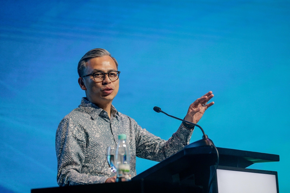 Communications Minister Fahmi Fadzil said the decision on implementing the second 5G network will be based on the bids submitted by the MNOs. — Picture by Sayuti Zainudin 