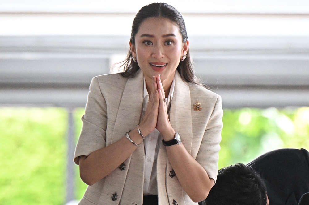 Pheu Thai party leader Paetongtarn Shinawatra, known by her nickname ‘Ung Ing’ and daughter of former prime minister Thaksin Shinawatra, greets members of the media at local news outlet Voice TV in Bangkok August 16, 2024.