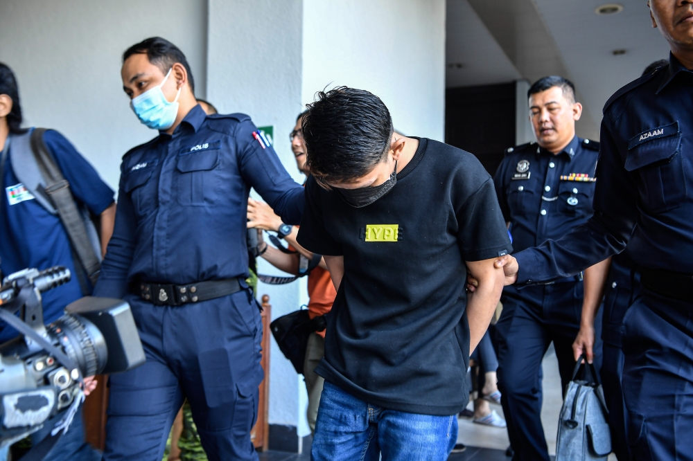 An amateur football player, whose photo carrying a ‘kerambit’ went viral on social media, was sentenced to 14 days in prison by the Sessions Court here today for displaying the sharp weapon during a football match two weeks ago. — Bernama pic