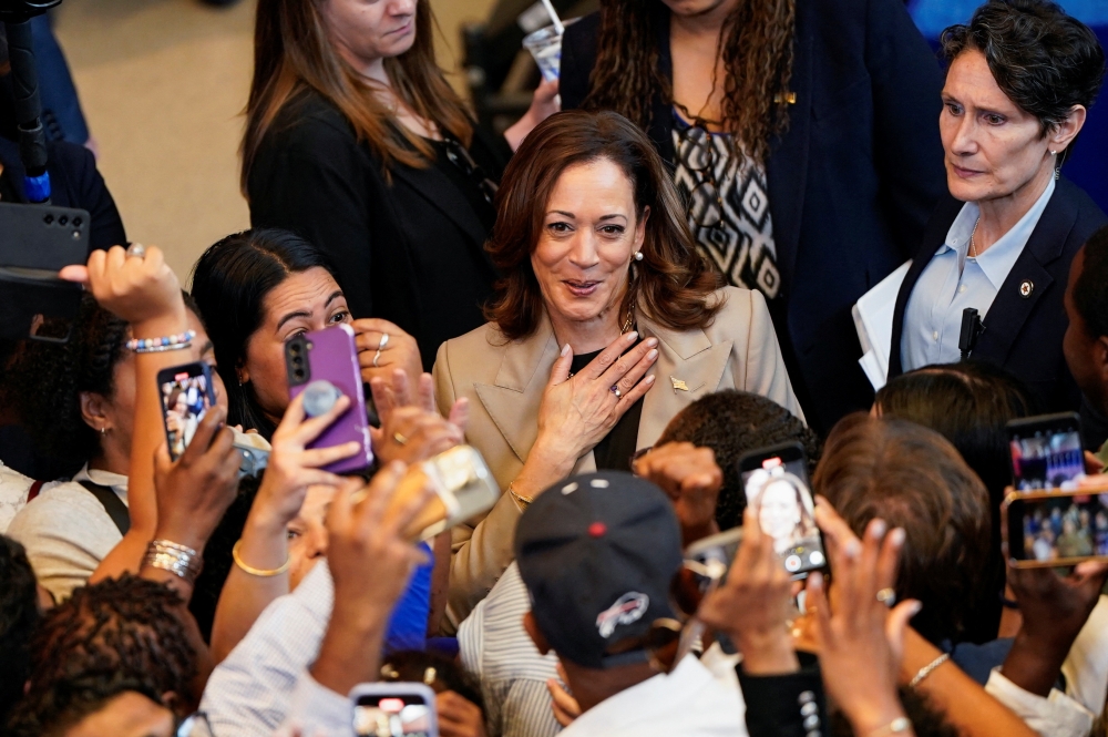 US Vice President Kamala Harris greets supporters in Prince George's County, Maryland. — Reuters pic