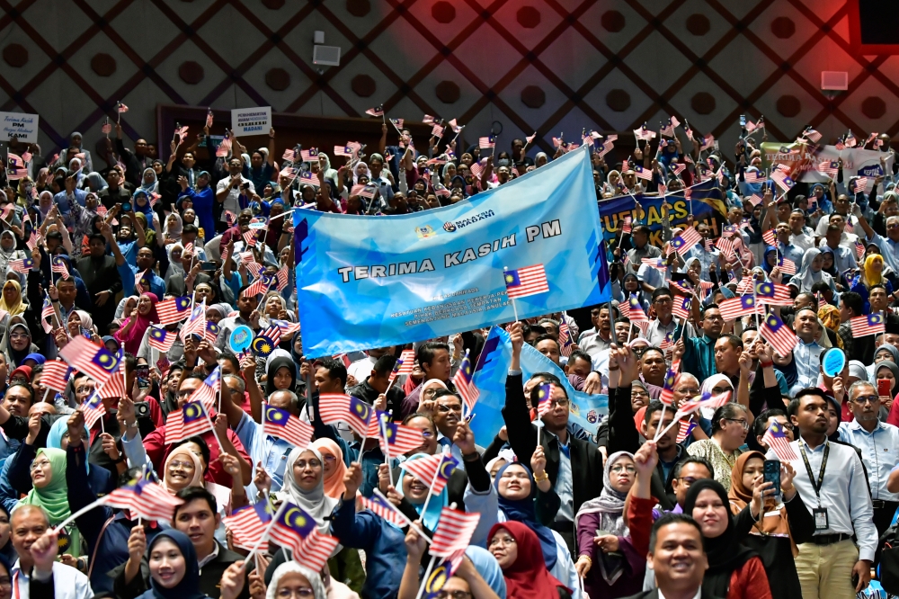 Civil servants are seen at a gathering at the Putrajaya International Convention Centre, August 16 2024. — Bernama pic