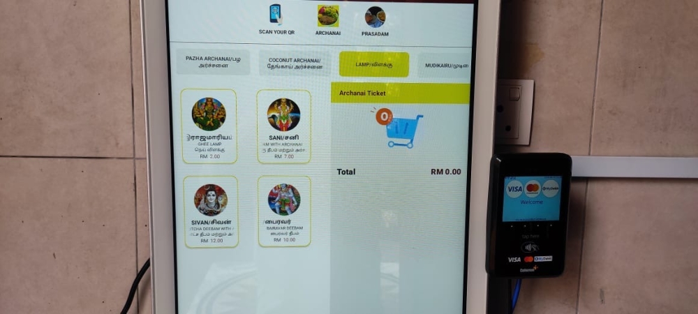 Devotees can place order and pay for prayer services at the self-service kiosks at the Arulmigu Rajamariamman Devasthanam in Johor Baru. — Picture courtesy of Arulmigu Rajamariamman Devasthanam