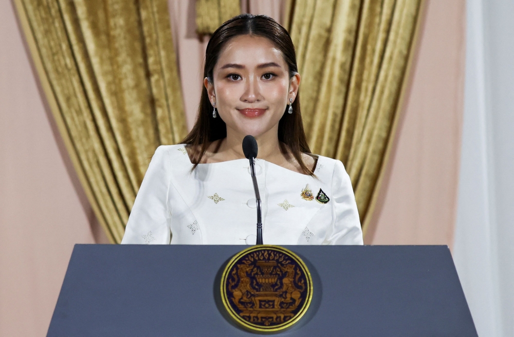 Thailand's Prime Minister Paetongtarn Shinawatra attends a press conference at the Pheu Thai party headquarters following a royal endorsement ceremony in Bangkok, Thailand, August 18, 2024. — Reuters pic  