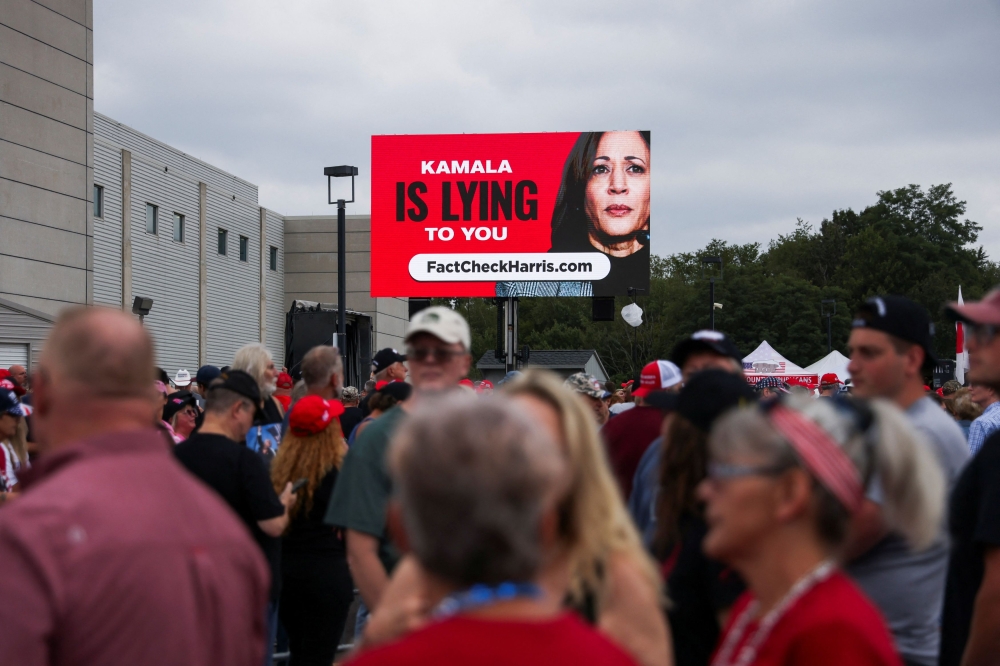 A billboard displays U.S. Vice President and Democratic presidential nominee Kamala Harris on the day of a campaign rally of Republican presidential nominee and former U.S. President Donald Trump in Wilkes-Barre, Pennsylvania, U.S. August 17, 2024. — Reuters pic